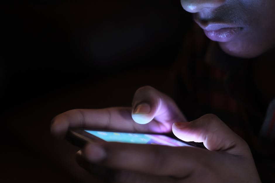 person browsing keynote speaker website on mobile phone