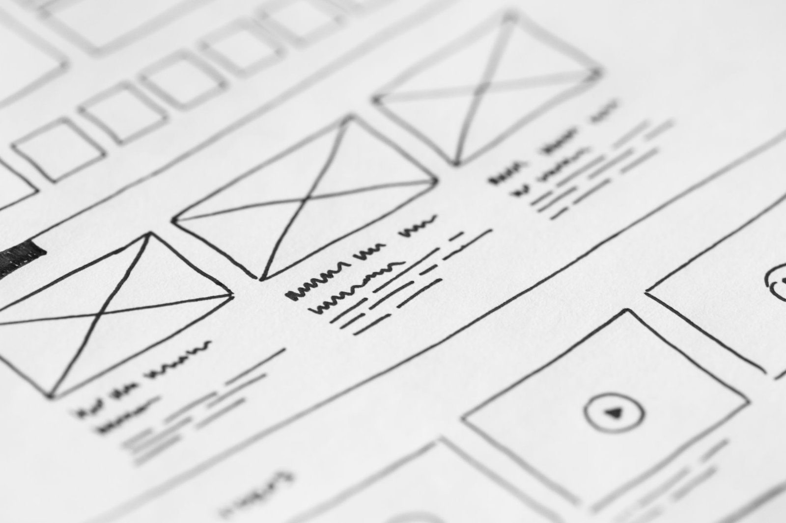 hand-drawn website wireframe sketch on paper representing the complete sitemap of pages a keynote speaker website needs